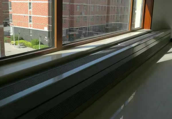 保定黃莊物業樓(幕墻前進上出型自然對流銅管鋁翅片包圍一體式散熱器)安裝